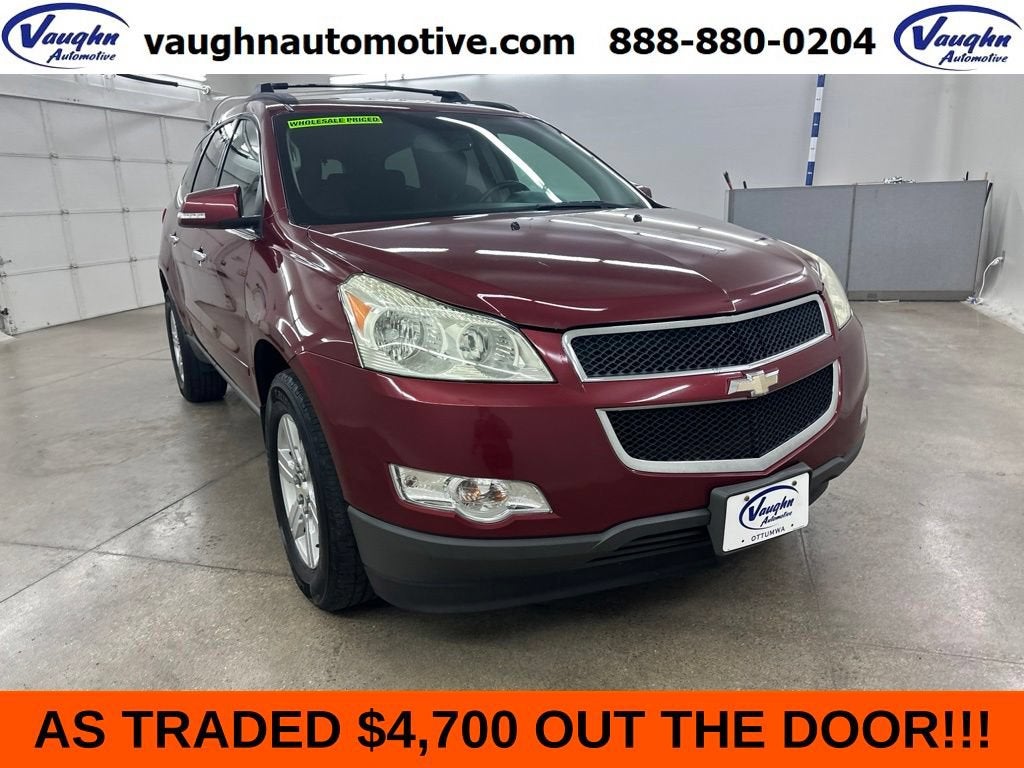 2010 Chevrolet Traverse LT w/1LT in Red Jewel Tintcoat — front three-quarter view