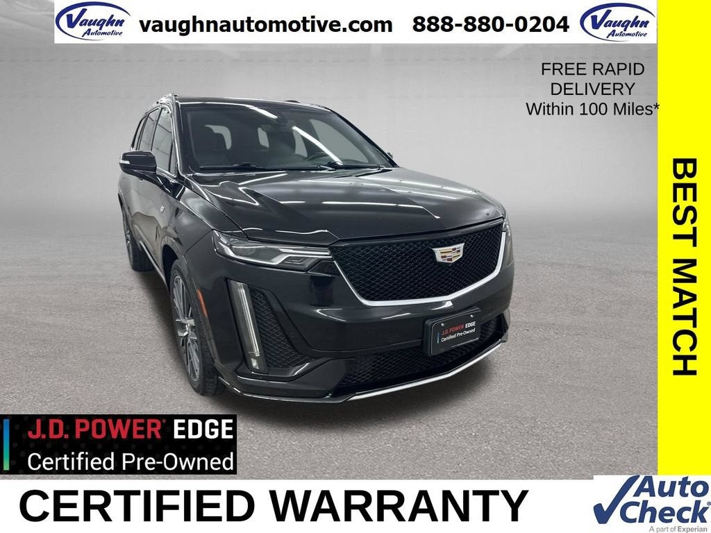 2023 Cadillac XT6 Sport in Stellar Black Metallic — front three-quarter view