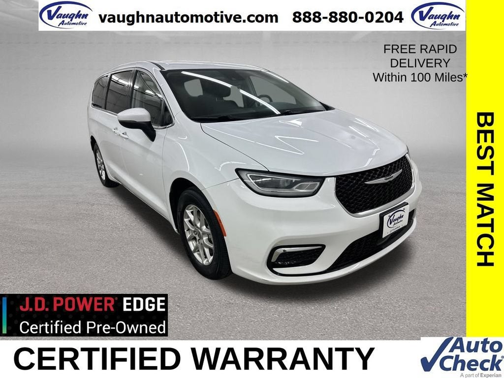 2023 Chrysler Pacifica Touring L in White — front three-quarter view