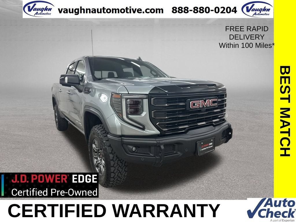 2024 GMC Sierra 1500 AT4X in Sterling Metallic — front three-quarter view