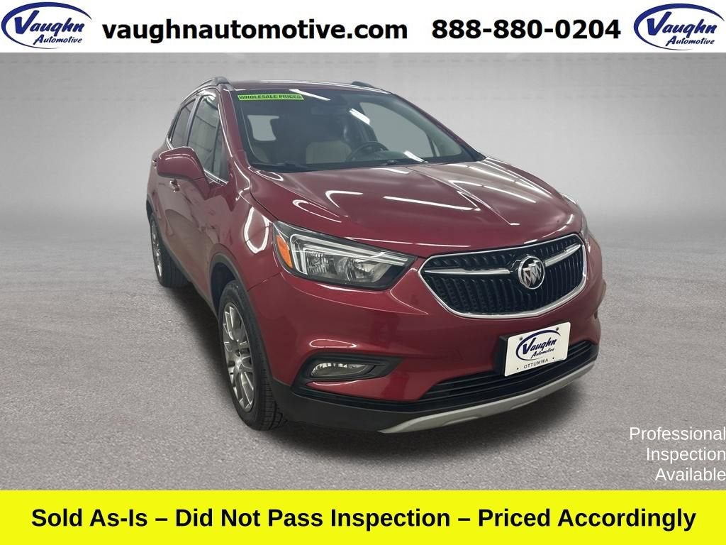 2020 Buick Encore Sport Touring in Includes (Mdp) Anthracite Lower Exterior Accent Color, Paint Code W598f. — front three-quarter view